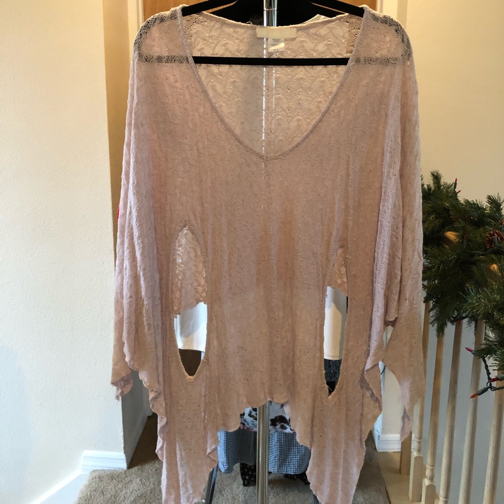 Pink sweater poncho